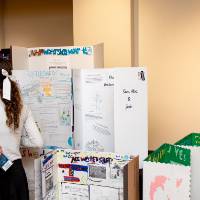 Array of student posters at student project showcase